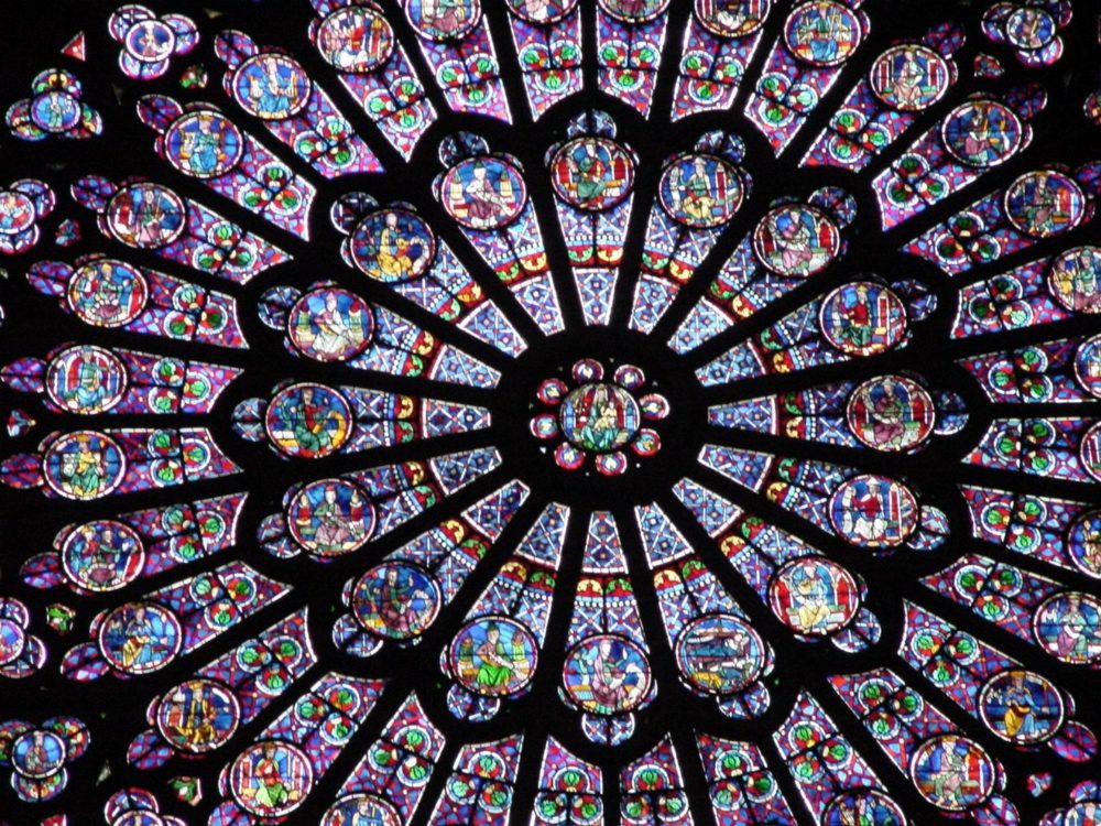 One of Notre-Dame's great rose windows, a wheel of colored glass medallions around a central circle.