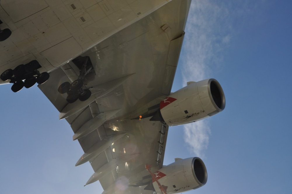 Qantas A380 overhead on approach, flaps and gear extended.